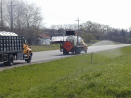 Chemical Truck Spraying a Roadside
